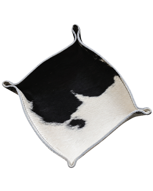 Black and ivory genuine cowhide valet tray on transparent background
