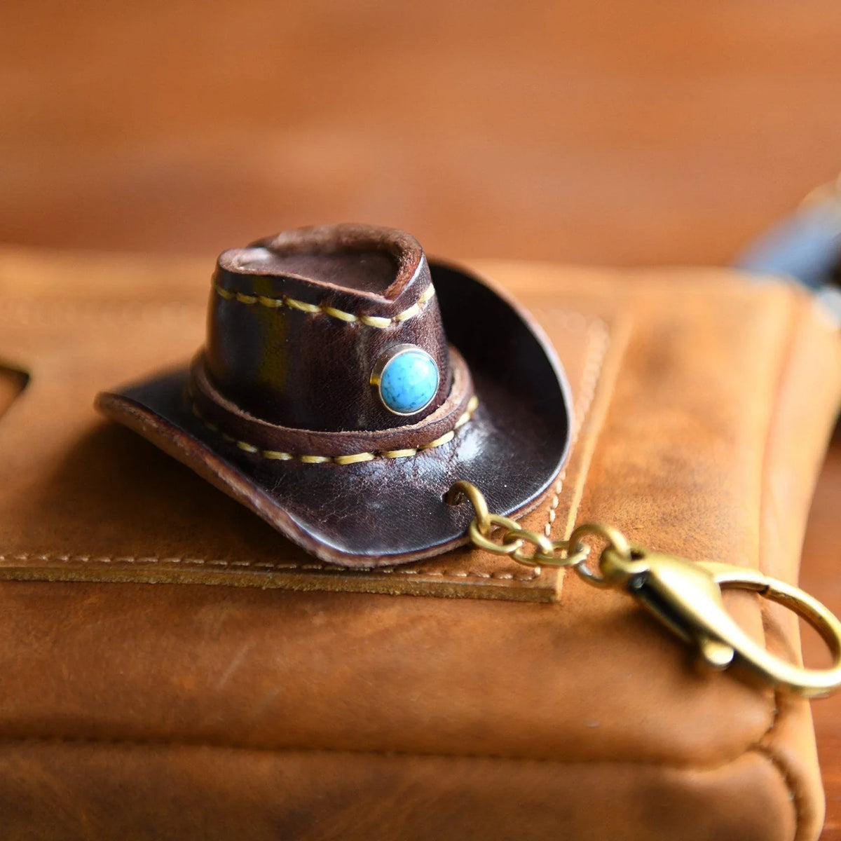 Dark Coffee cowhide mini cowboy hat keychain, styled product view