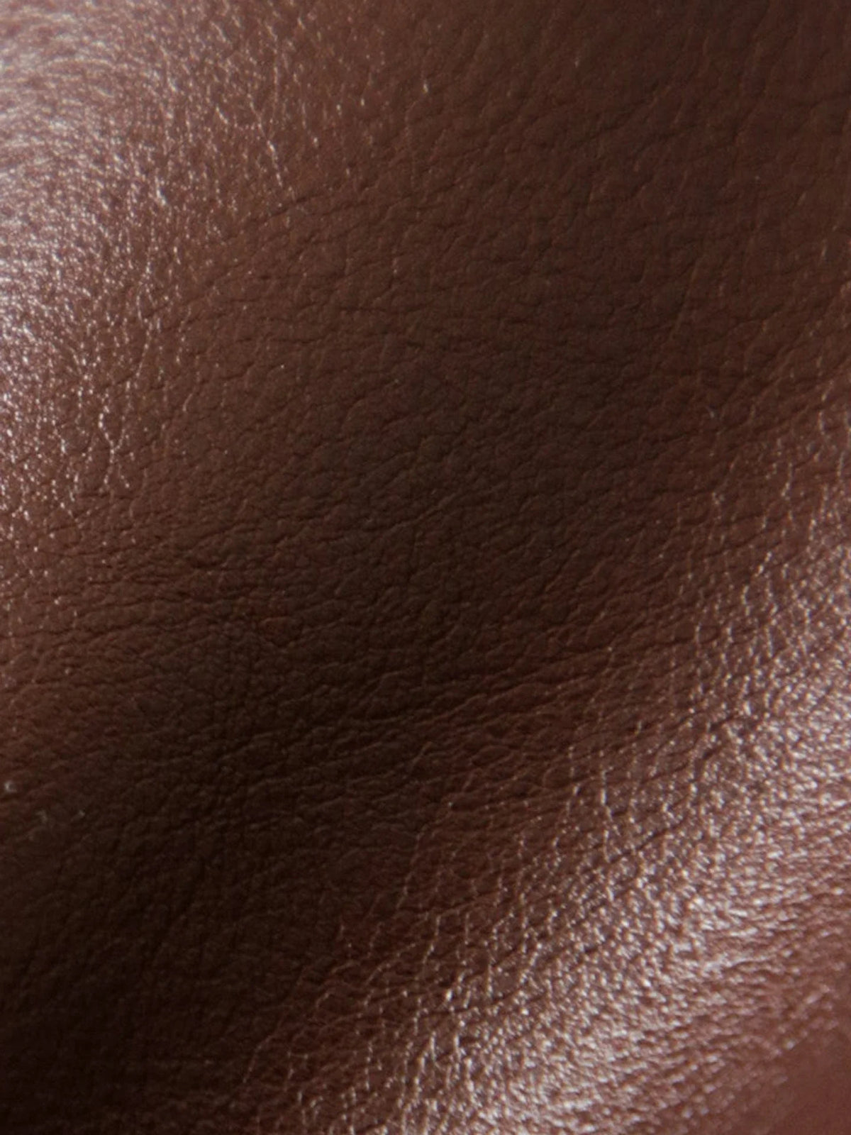 Close view of the natural grain and luster of vegetable-tanned leather