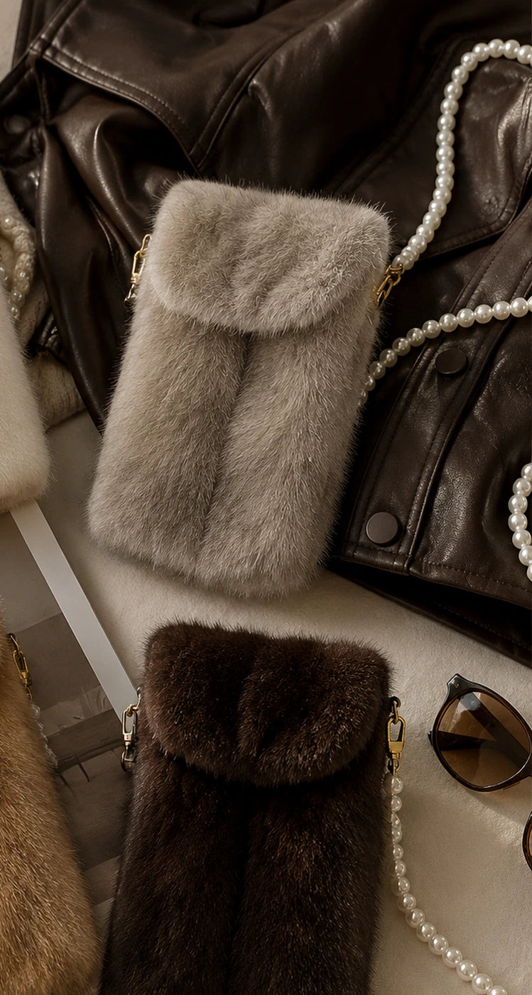 Genuine mink fur phone crossbody bag styled with leather, knitwear, and pearl strap details