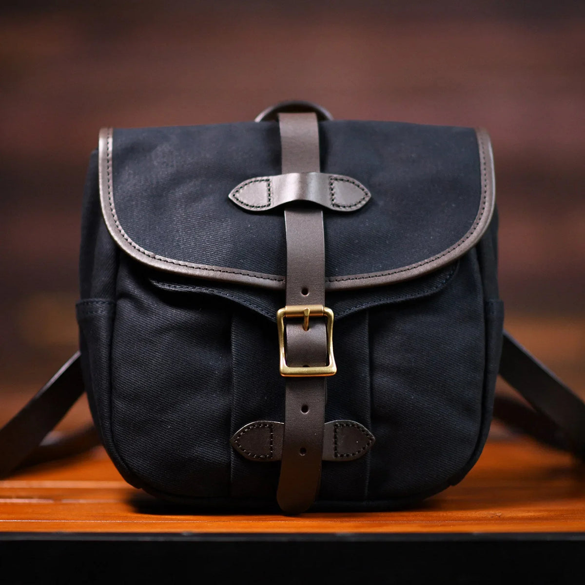 Slate blue waxed canvas and leather messenger bag full front view