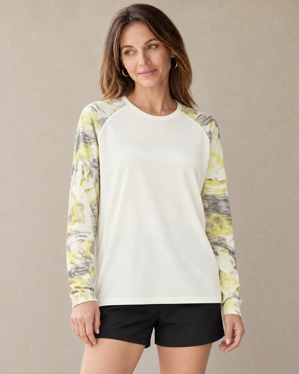 Merino Wool Raglan Top with Nature-Inspired Sleeves worn by an adult model