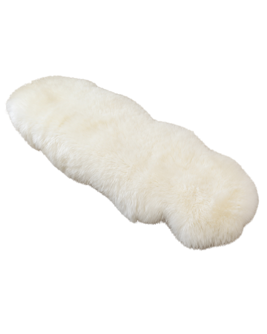 Capricornus Living Ivory White genuine sheepskin sofa runner on a transparent background