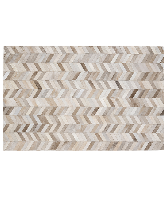 Capricornus Living Herringbone Beige genuine cowhide patchwork area rug on a transparent background