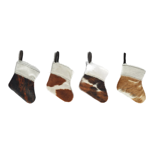 Capricornus Living Four-piece genuine hair-on cowhide mini holiday stocking ornament set on a transparent background