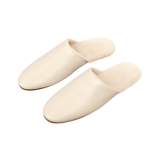 Capricornus Living Ivory genuine lambskin plush-lined house slippers on a transparent background