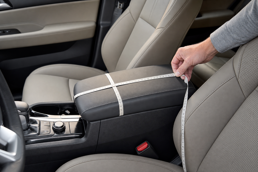 Measuring a car center-console armrest with a flexible tape