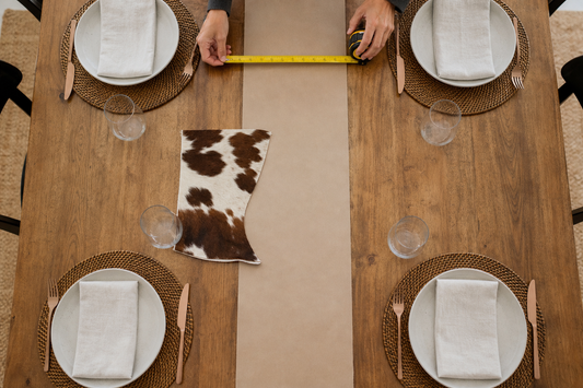 Dining table measured with a centered 30 centimeter runner lane and full place settings