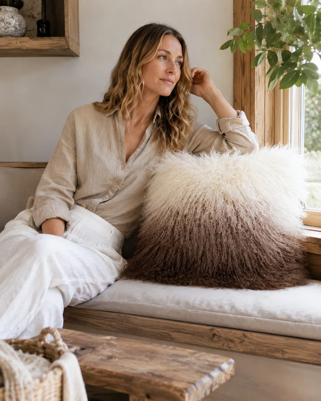 Capricornus Living Brown Gradient lamb wool pillow in a calm living room