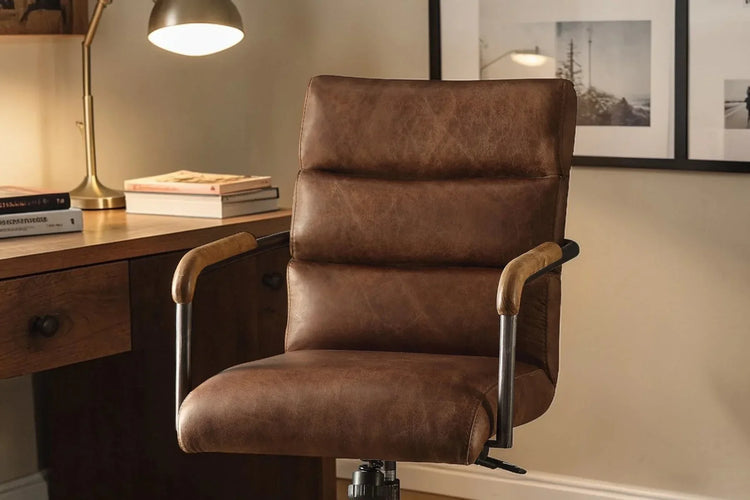 A top-grain leather office chair in a considered workspace