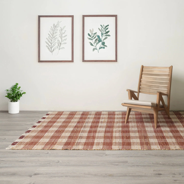 Plaid jute area rug styled in a living space