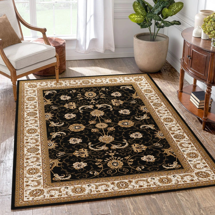 Traditional black floral area rug styled in a warm living room
