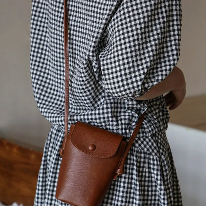 Women's brown top-grain cowhide phone crossbody bag with flap closure