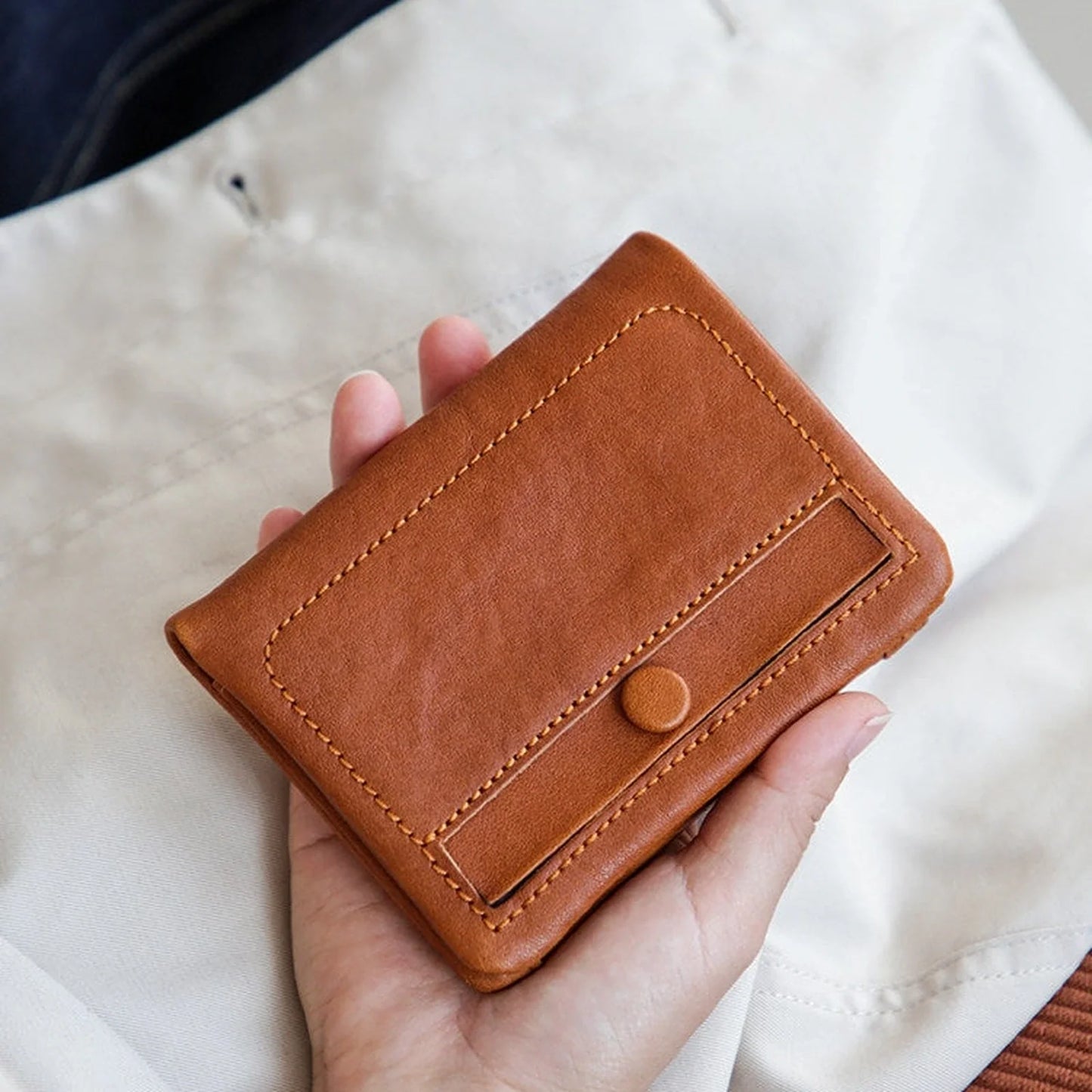 Cognac vegetable-tanned leather short wallet front view