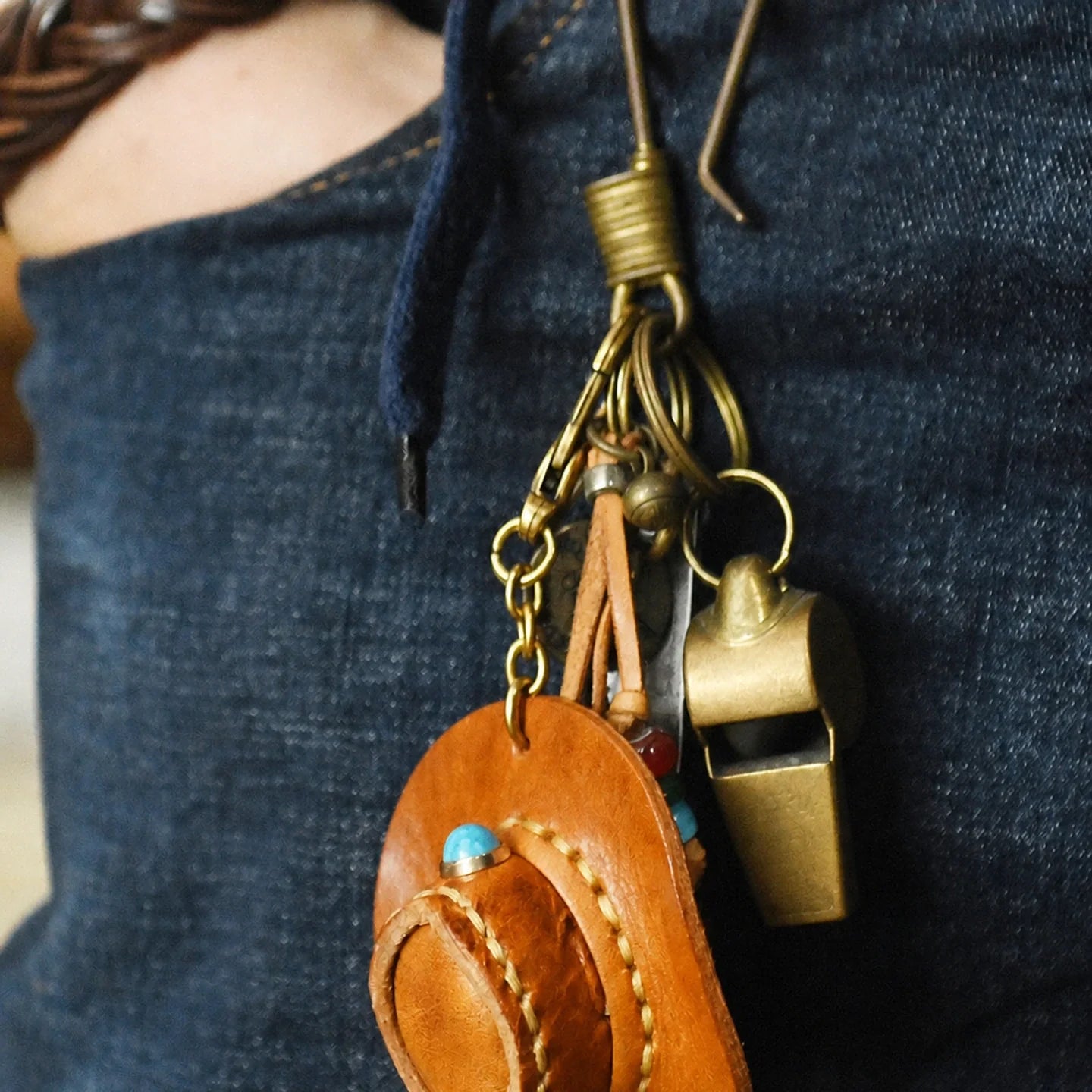 Sunset Yellow cowhide mini cowboy hat keychain worn as a bag charm