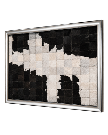 Black and ivory framed genuine cowhide patchwork wall art on a transparent background