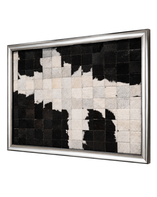 Black and ivory framed genuine cowhide patchwork wall art on a transparent background