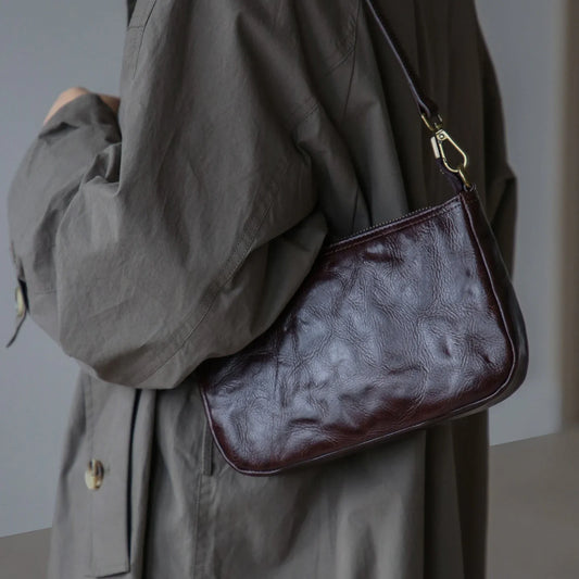 Ebony Coffee vegetable-tanned top-grain leather shoulder bag worn crossbody