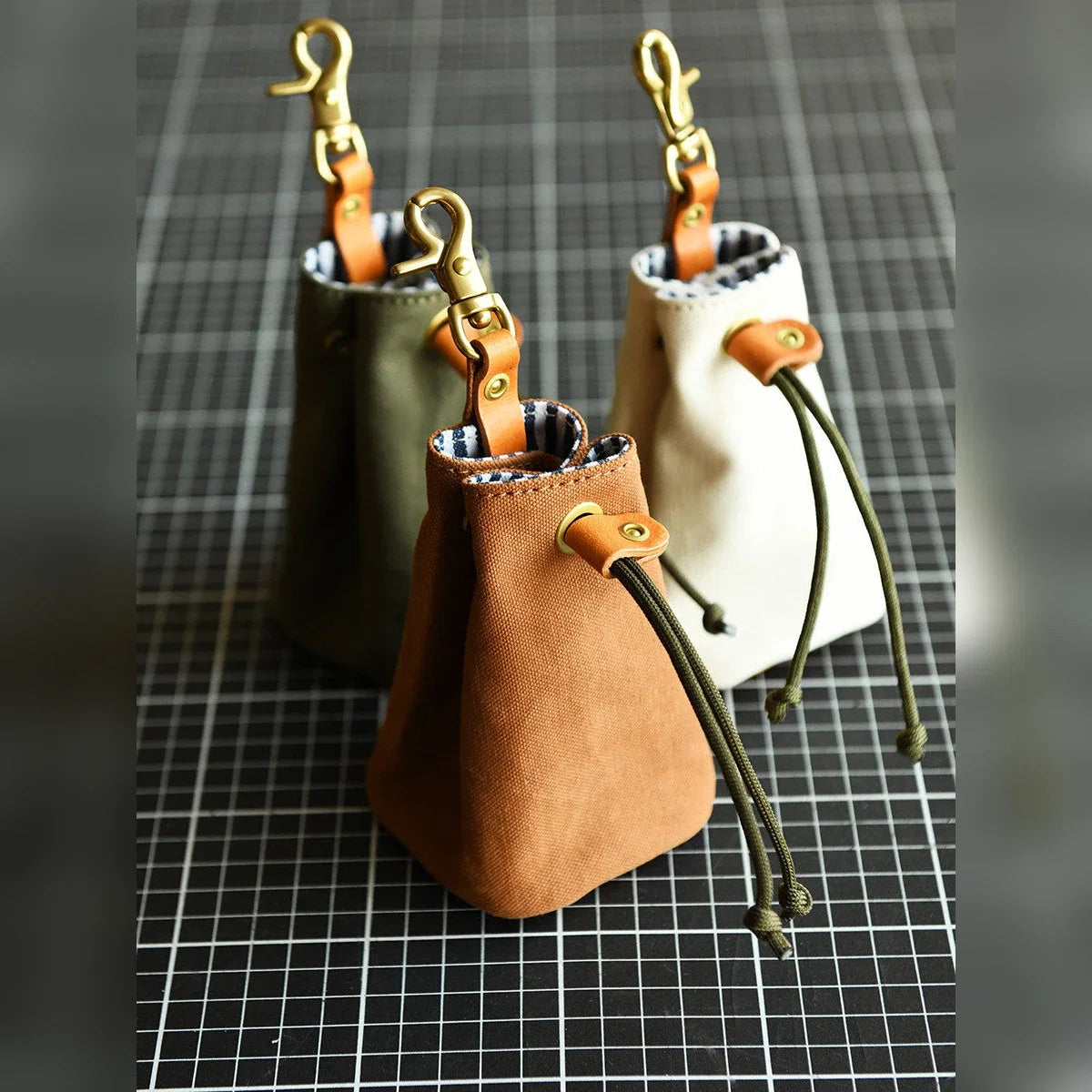 Canvas and leather drawstring pouch in four colors