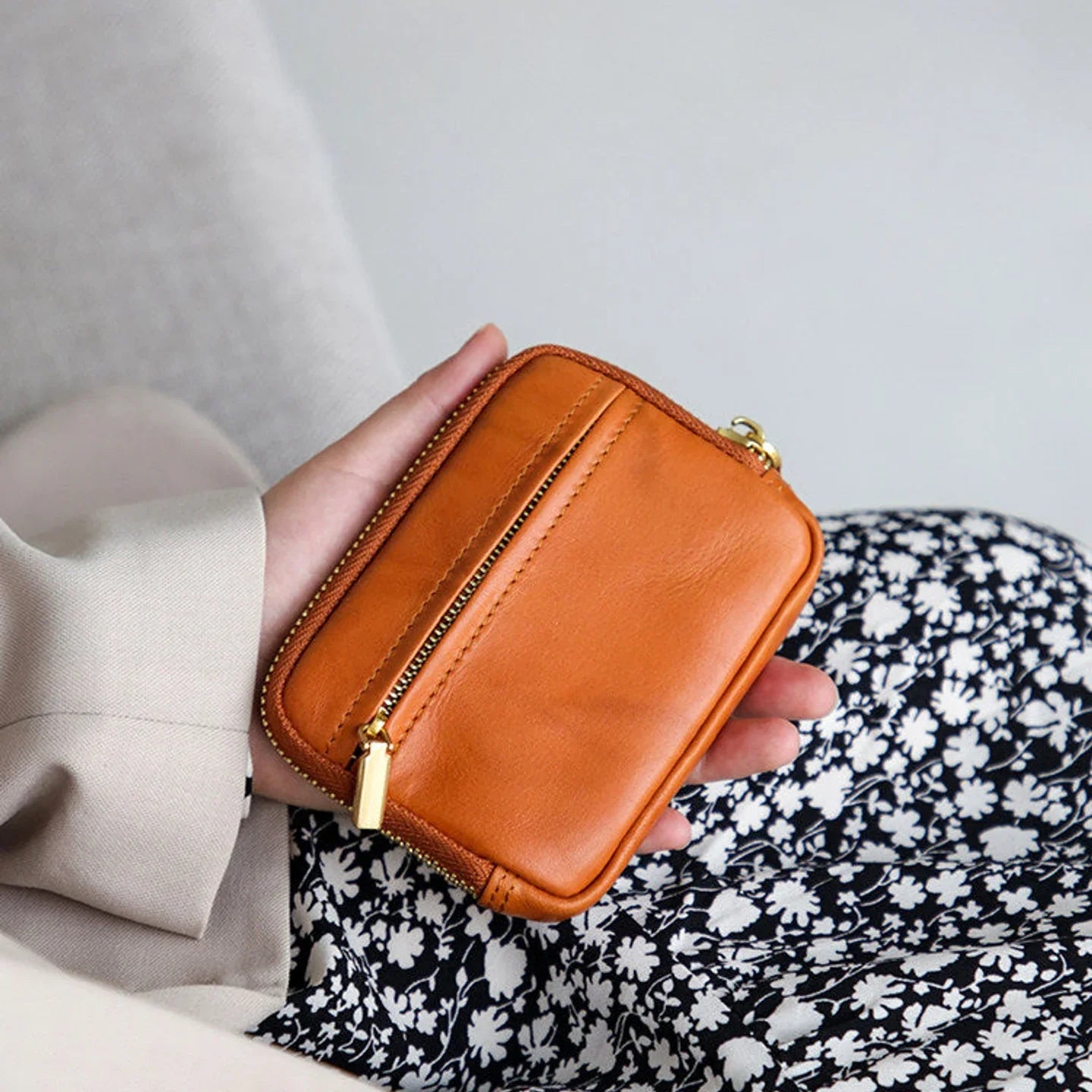 Women's orange top-grain cowhide coin wallet with front zipper pocket
