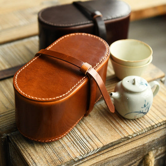 Vegetable-tanned leather tea set travel case in a tea setting