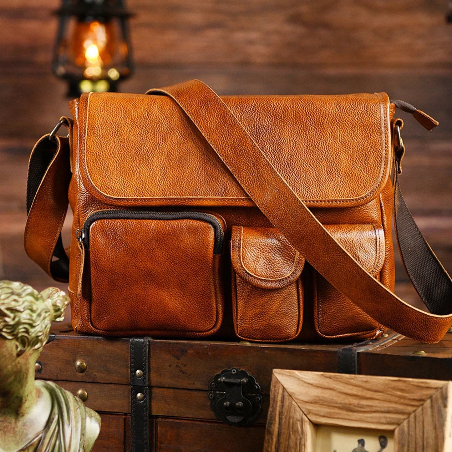 First-layer cowhide messenger bag in vintage brown, styled lifestyle view