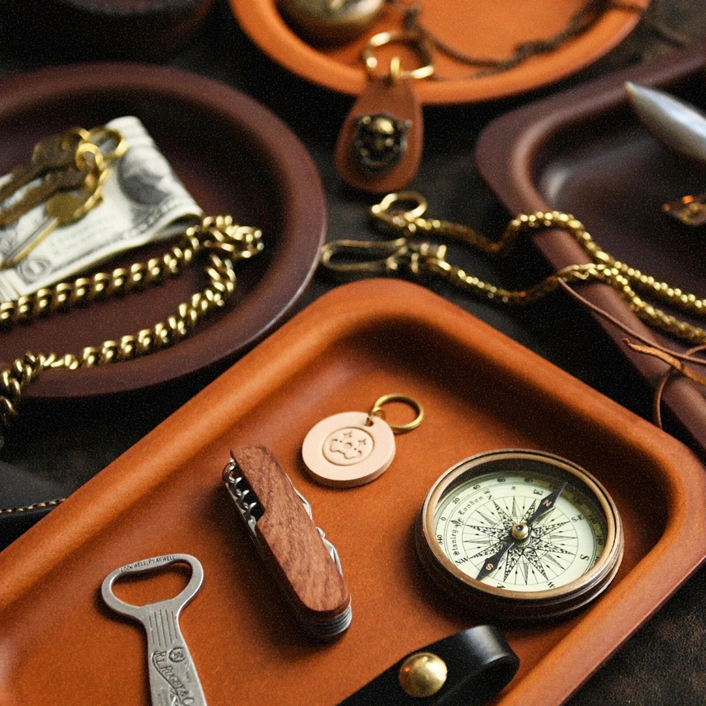 Vintage vegetable-tanned cowhide valet tray styled with everyday objects
