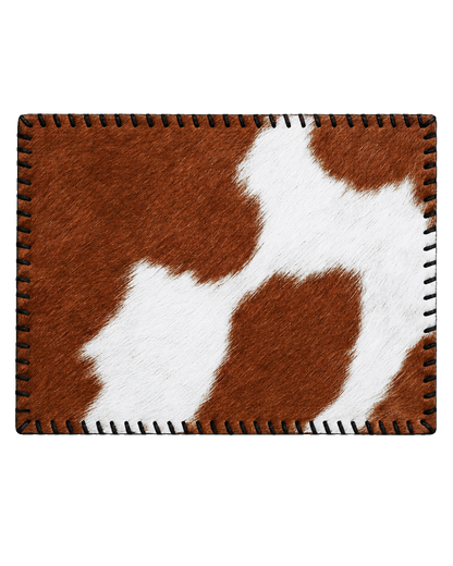 Brown and ivory genuine cowhide rectangular placemat with hand-laced border on transparent background