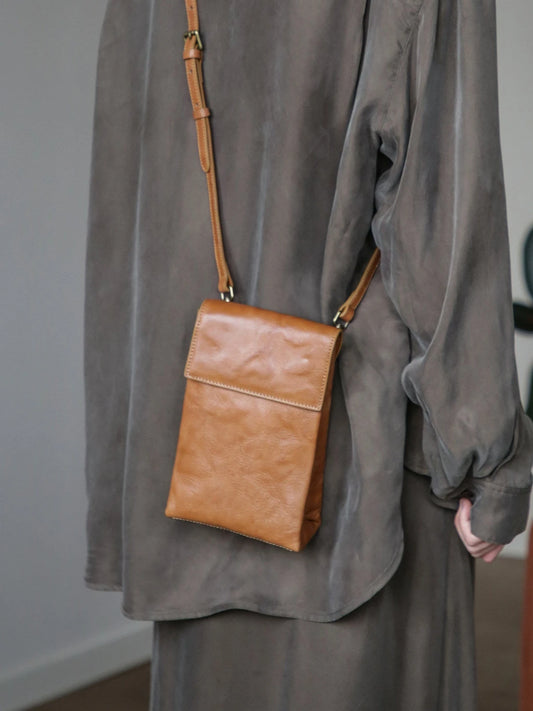 Chestnut brown vegetable-tanned leather phone crossbody bag