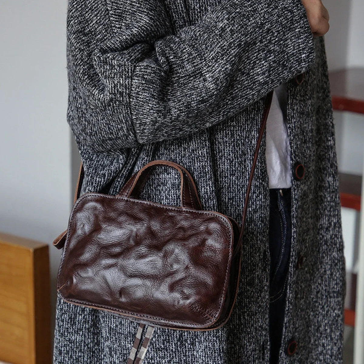 Coffee brown top-grain cowhide mini bag with crinkled leather texture