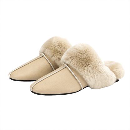 Camel genuine cowhide and rabbit fur mule slippers pair on a transparent background