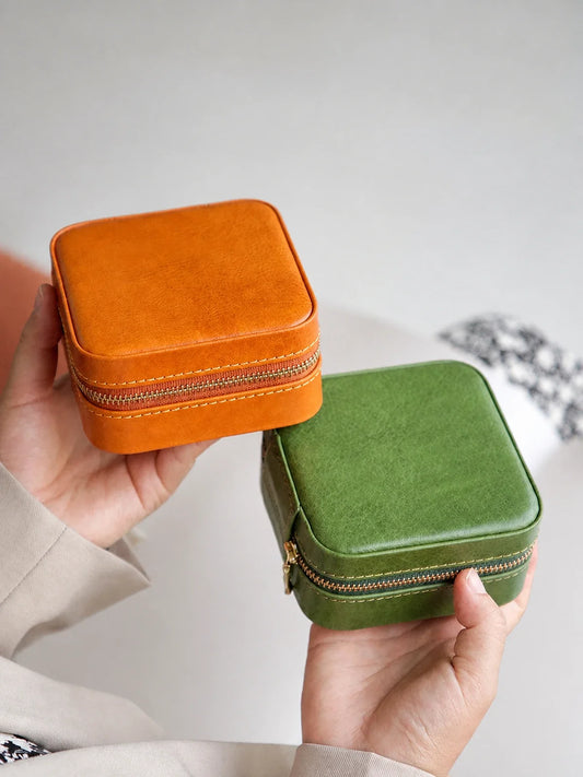 Burnt orange and olive green leather travel jewelry cases