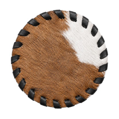 Single round genuine cowhide coaster with hand-laced dark leather edge on transparent background