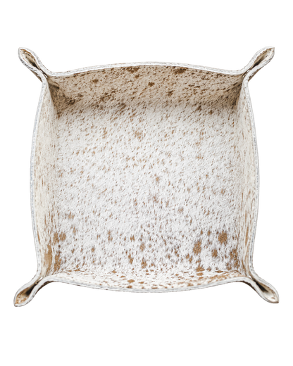Speckled ivory and tan genuine cowhide valet tray on transparent background