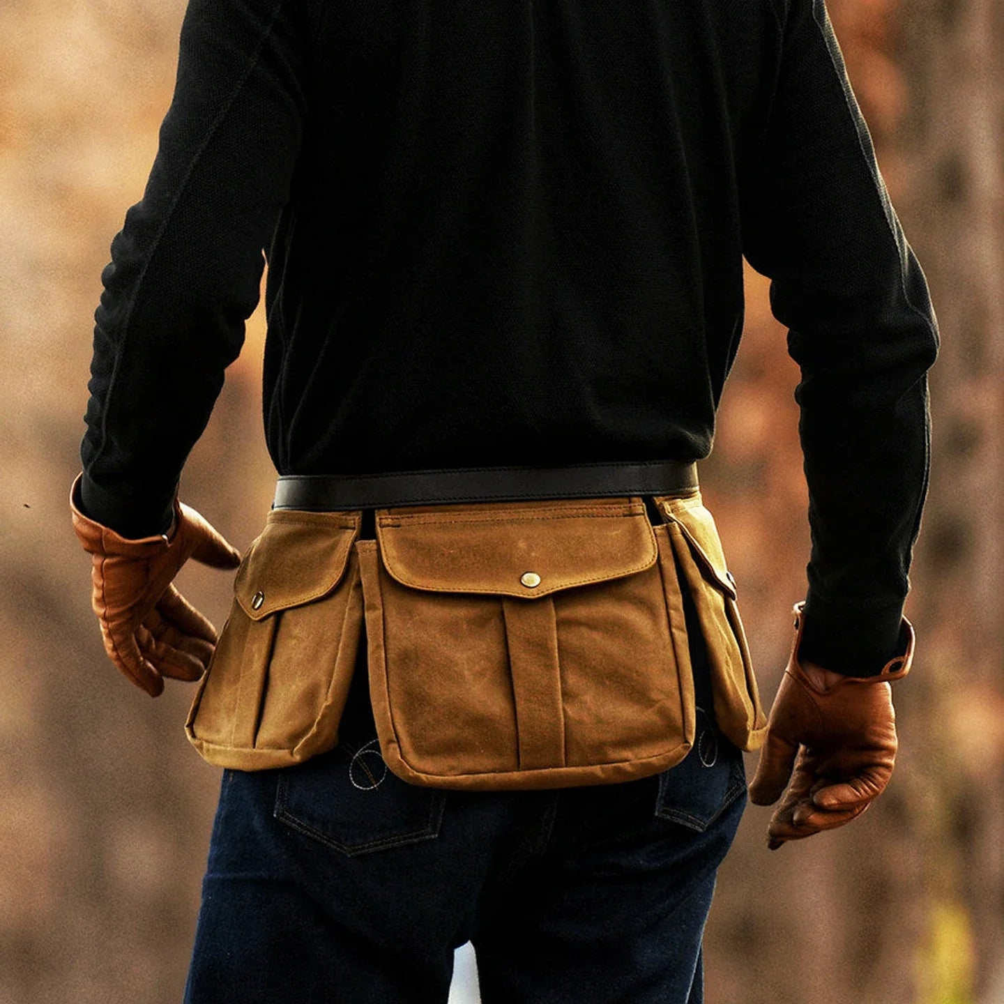 Vintage canvas waist bag styled for outdoor hands-free carry