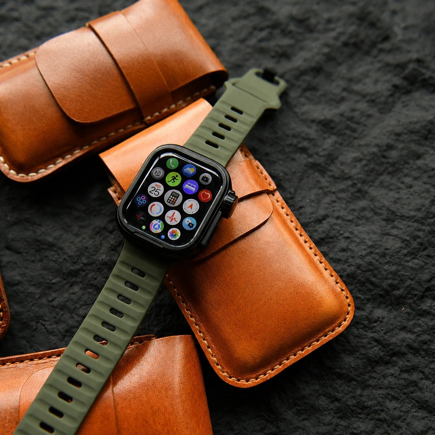 Leather watch pouch shown with a wristwatch for travel use