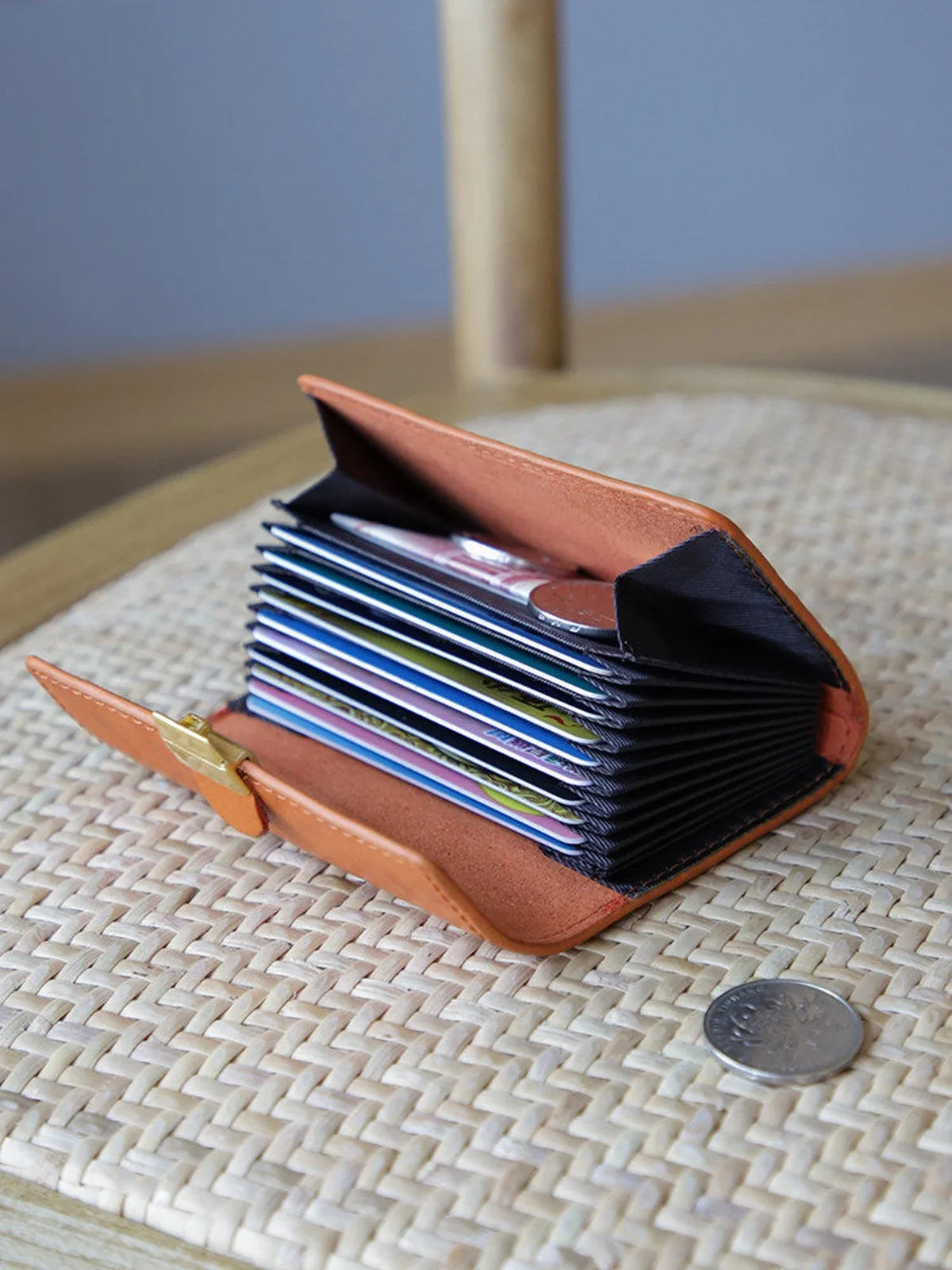 Accordion card storage interior in cognac leather card holder