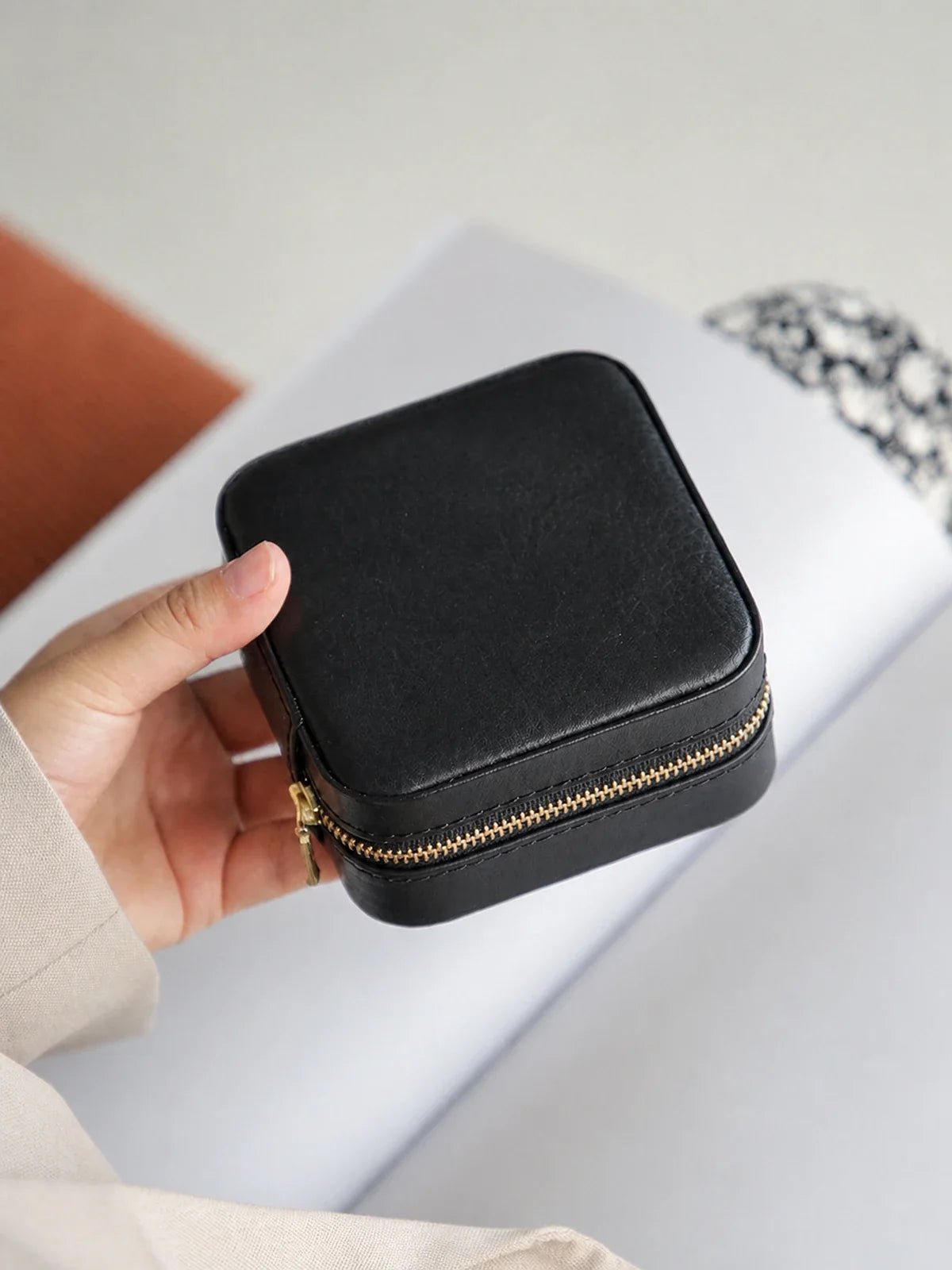 Black vegetable-tanned leather travel jewelry case