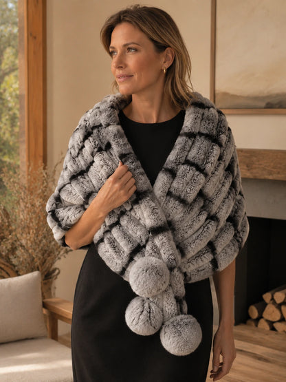 Woman styling a Chinchilla Gray Rex rabbit fur triangle shawl indoors