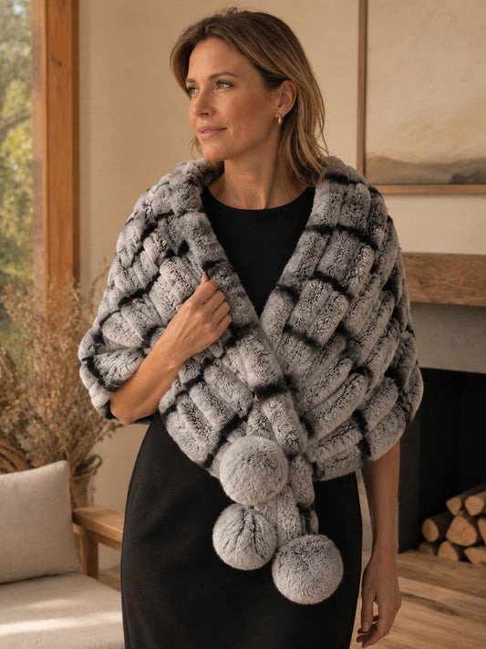 Woman styling a Chinchilla Gray Rex rabbit fur triangle shawl indoors