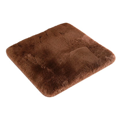 Coffee Brown genuine short-pile sheared-sheepskin patchwork chair pad on transparent background
