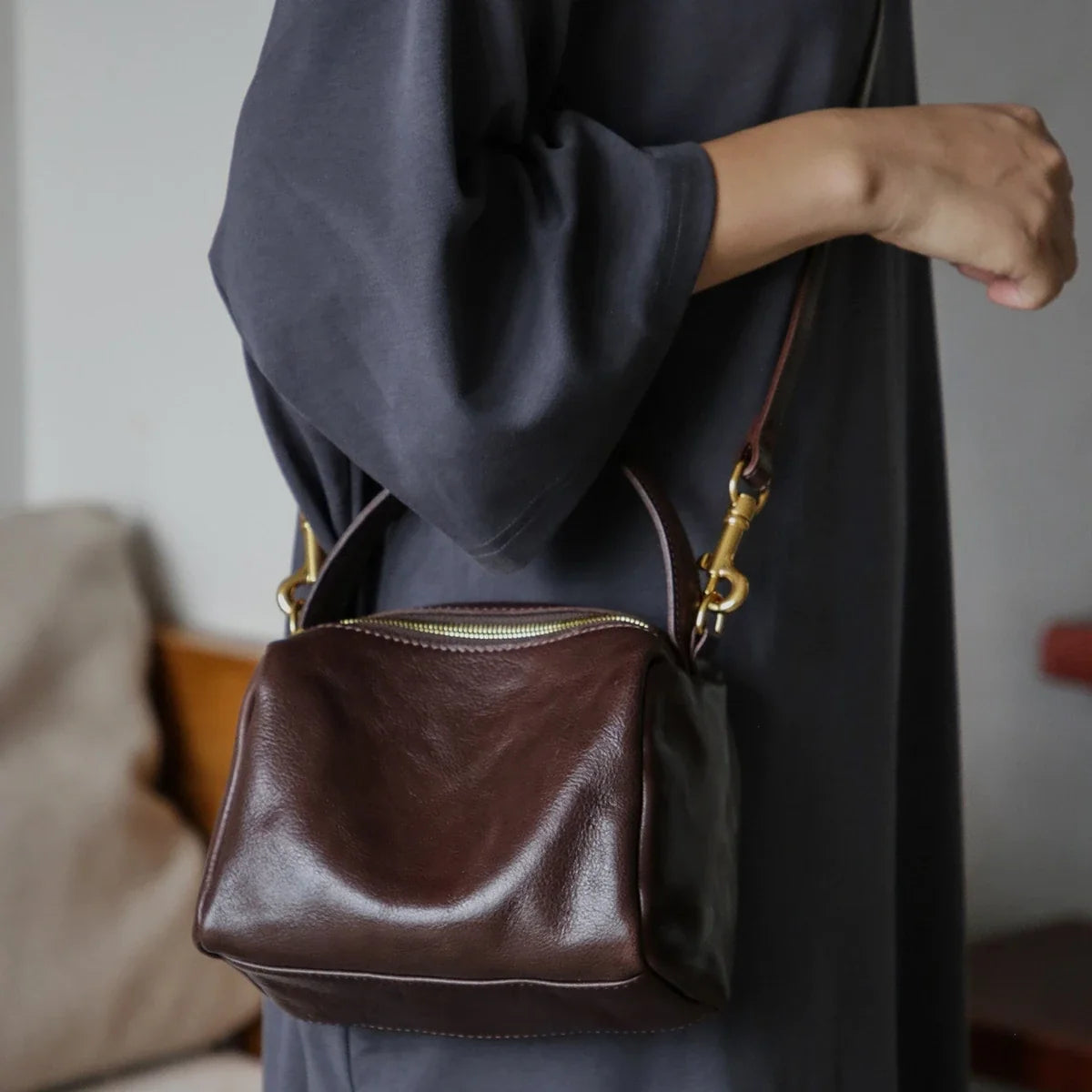 Women's coffee brown leather square bag worn on the shoulder