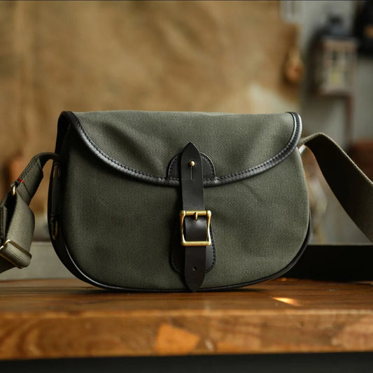 Olive green waxed canvas camera bag lifestyle product view