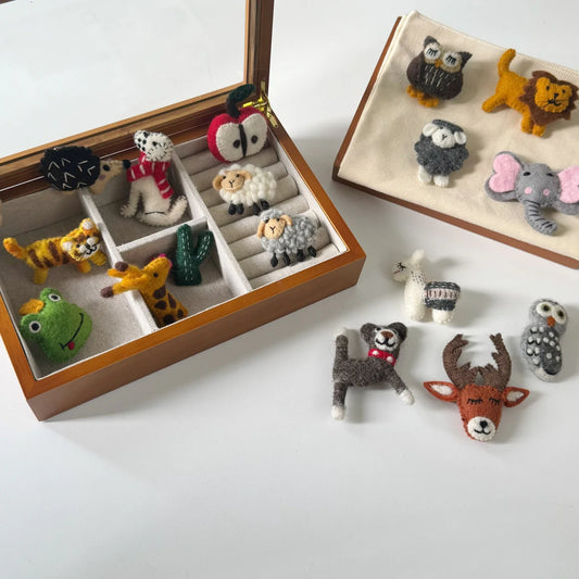 Artisan wool felt brooch collection arranged for styling and gifting