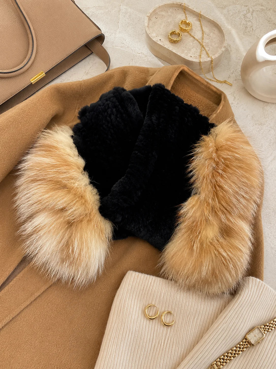 Black and champagne rabbit and fox fur wrap styled with neutral accessories