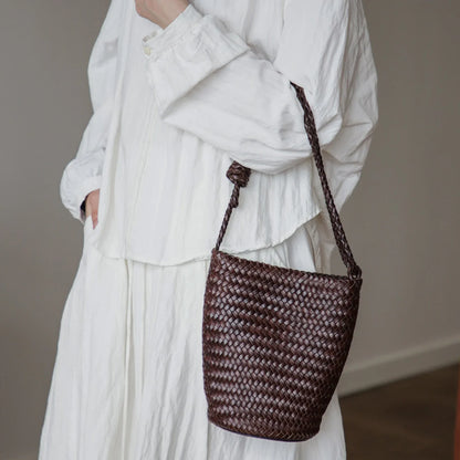 Coffee brown woven leather bucket bag with braided strap