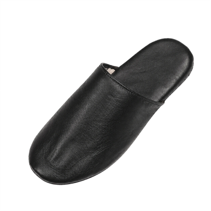 Black lambskin lightweight travel slipper angled view on a transparent background