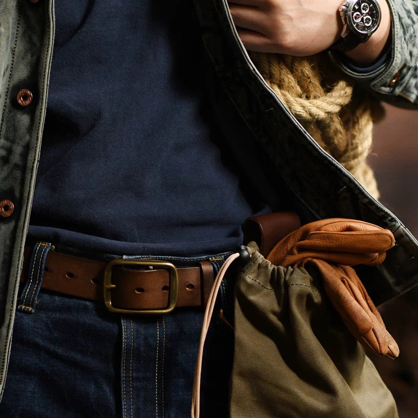 Drawstring belt pouch worn open for quick access