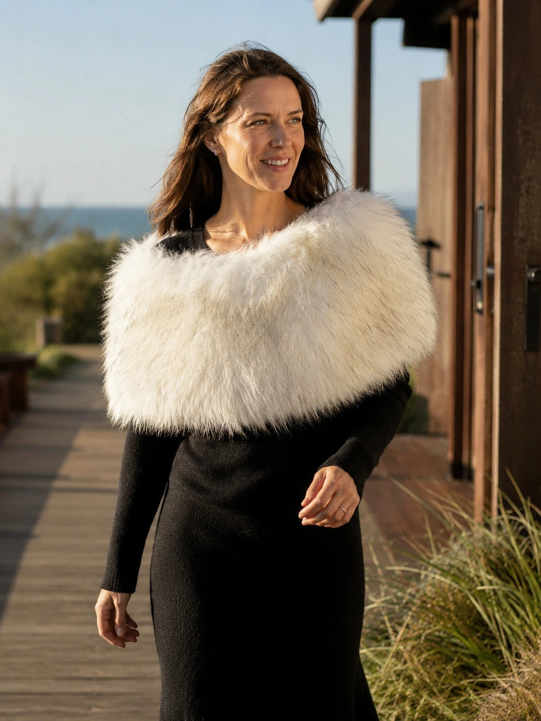 Ivory White raccoon fur shoulder wrap styled for a coastal occasion