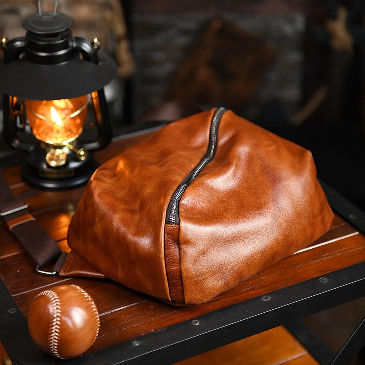 Cognac brown leather crossbody bag in a warm lifestyle setting